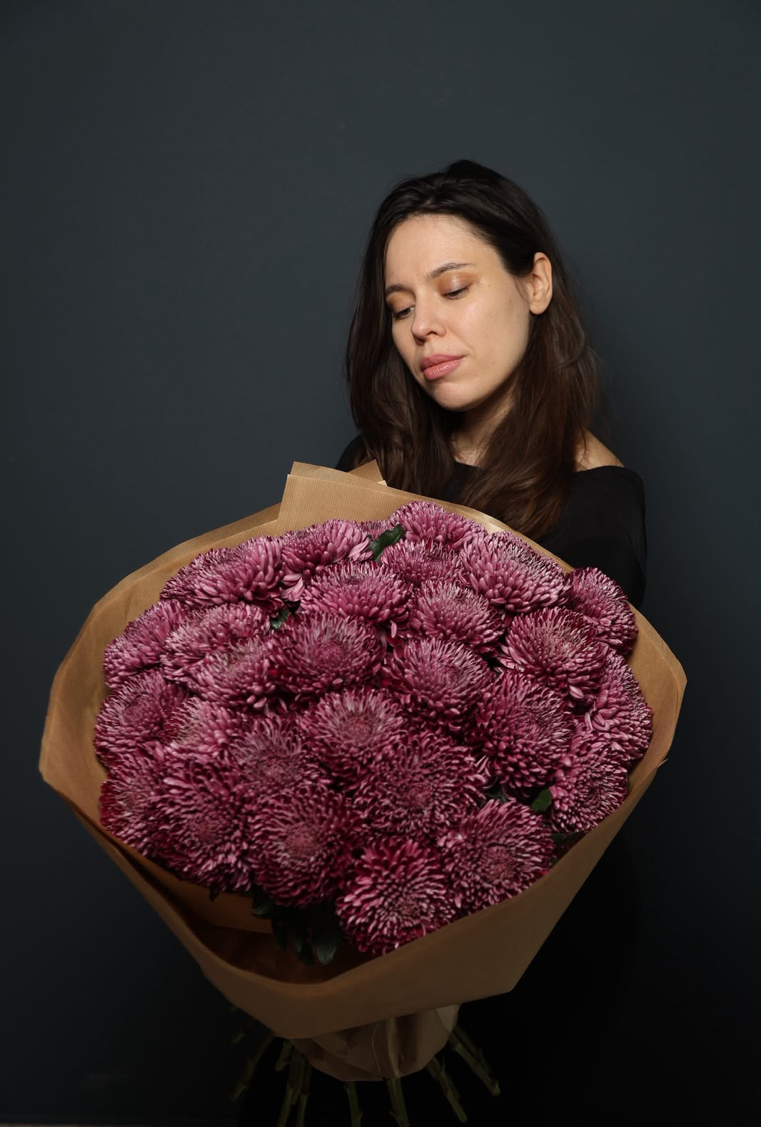 Velvet Bigoudi chrysanthemum bouquet with burgundy blooms in brown wrapping